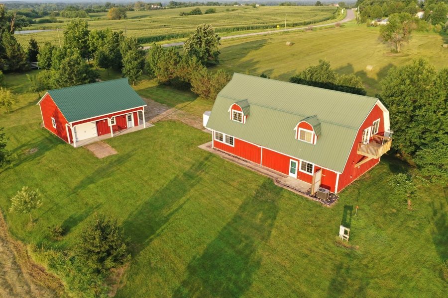 Country home with an outbuilding and shop on acreage